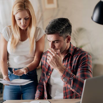 Couple reviewing financial statements