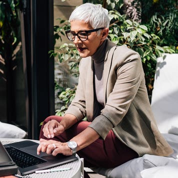 Middle aged woman on laptop