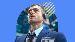 A trader on the stock exchange reacts with surprise