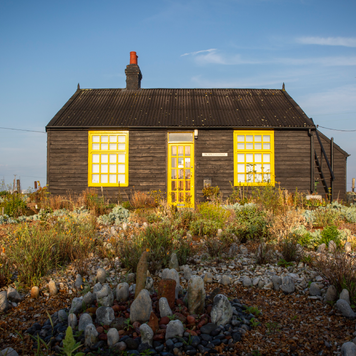 Prospect Cottage on a beautiful sunny mid summer morning, made famous by film maker Derek Jarman who found inspiration at Dungeness, where he created a shingle garden made from debris he found on nearby beaches on the 13th of August 2020 in Dungeness, Kent, United Kingdom. (photo by Andrew Aitchison / In pictures via Getty Images)